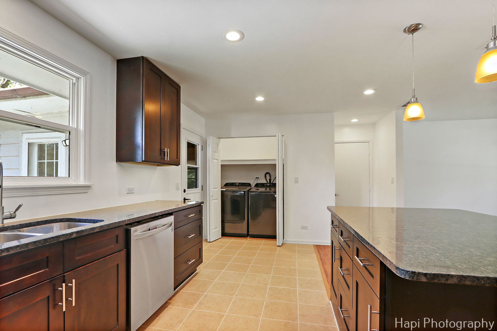 305 Pokagon Drive Algonquin, IL 60102 - Photo 9 of 28 a kitchen with a sink stove and cabinets