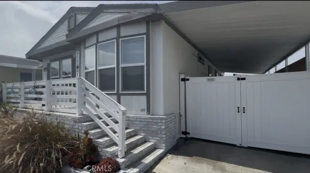 a view of entryway with wooden walls