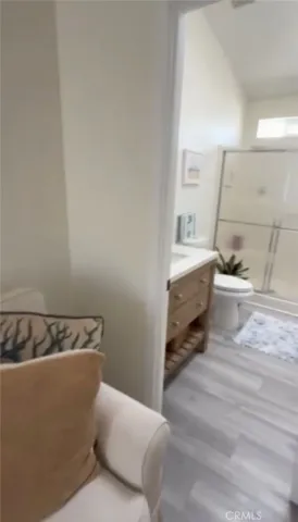 a bedroom with a bed and couch