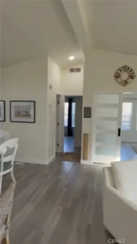 a room with a table and chairs