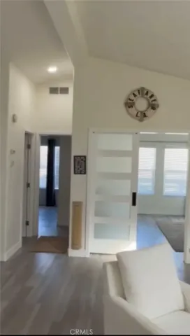 a street sign sitting on a wall