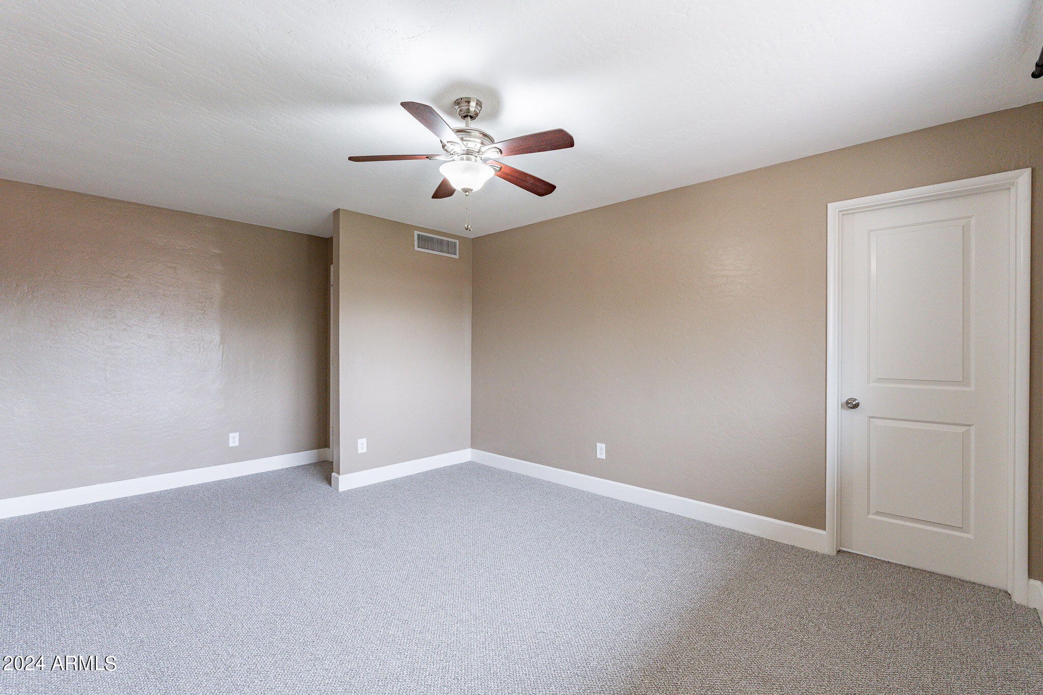 1320 East Orchid Lane Phoenix, AZ 85020 - Photo 25 of 48 wooden floor in an empty room