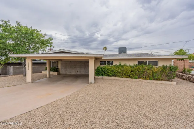 front view of a house with a street
