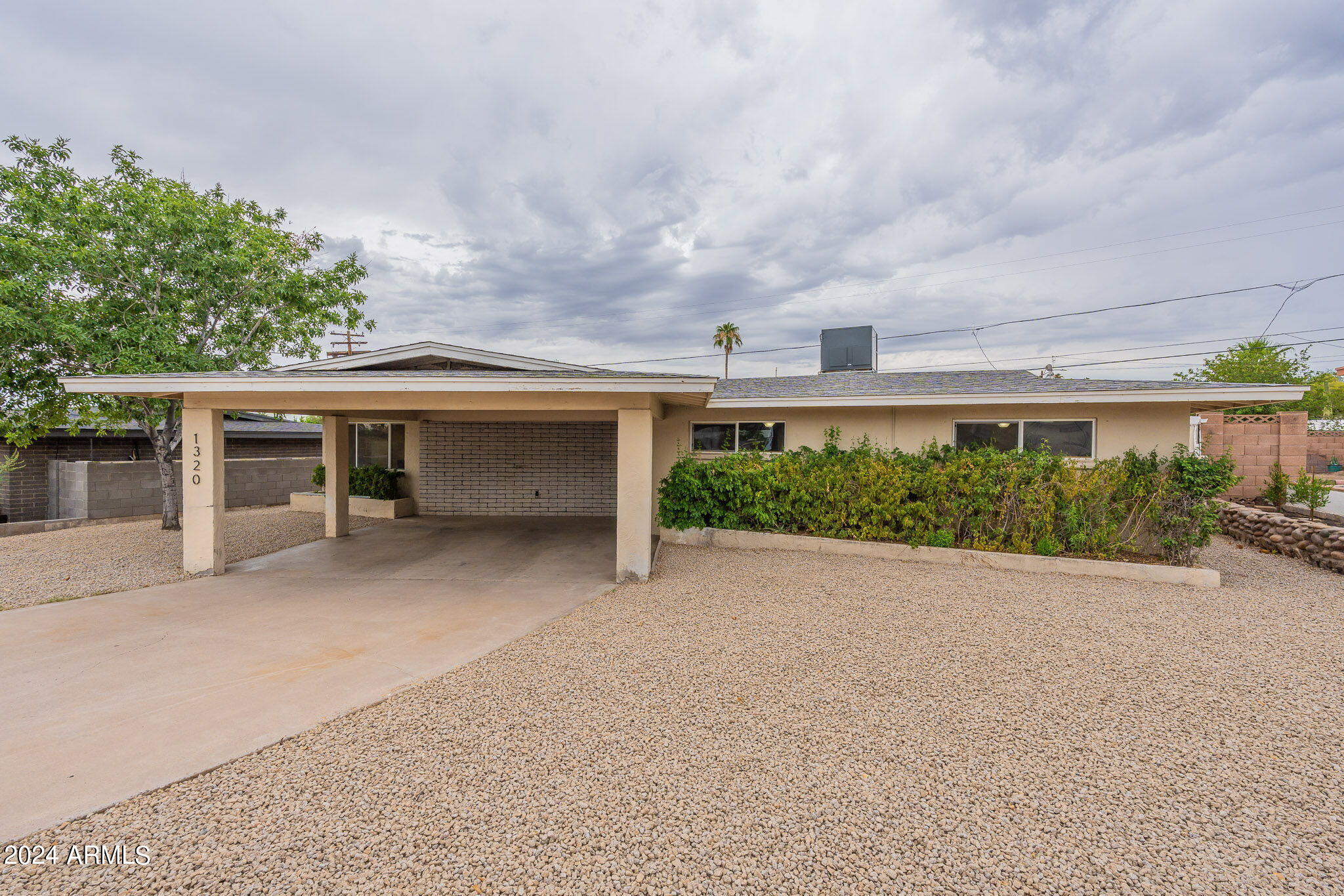 1320 East Orchid Lane Phoenix, AZ 85020 - Photo 4 of 48 front view of a house with a street