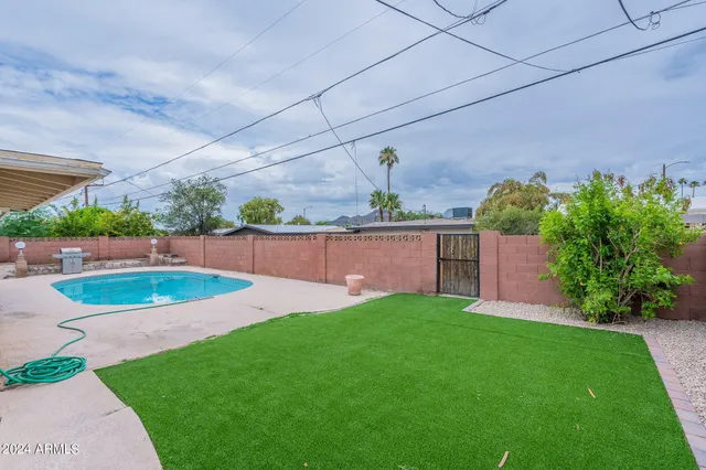 a view of a backyard with a garden