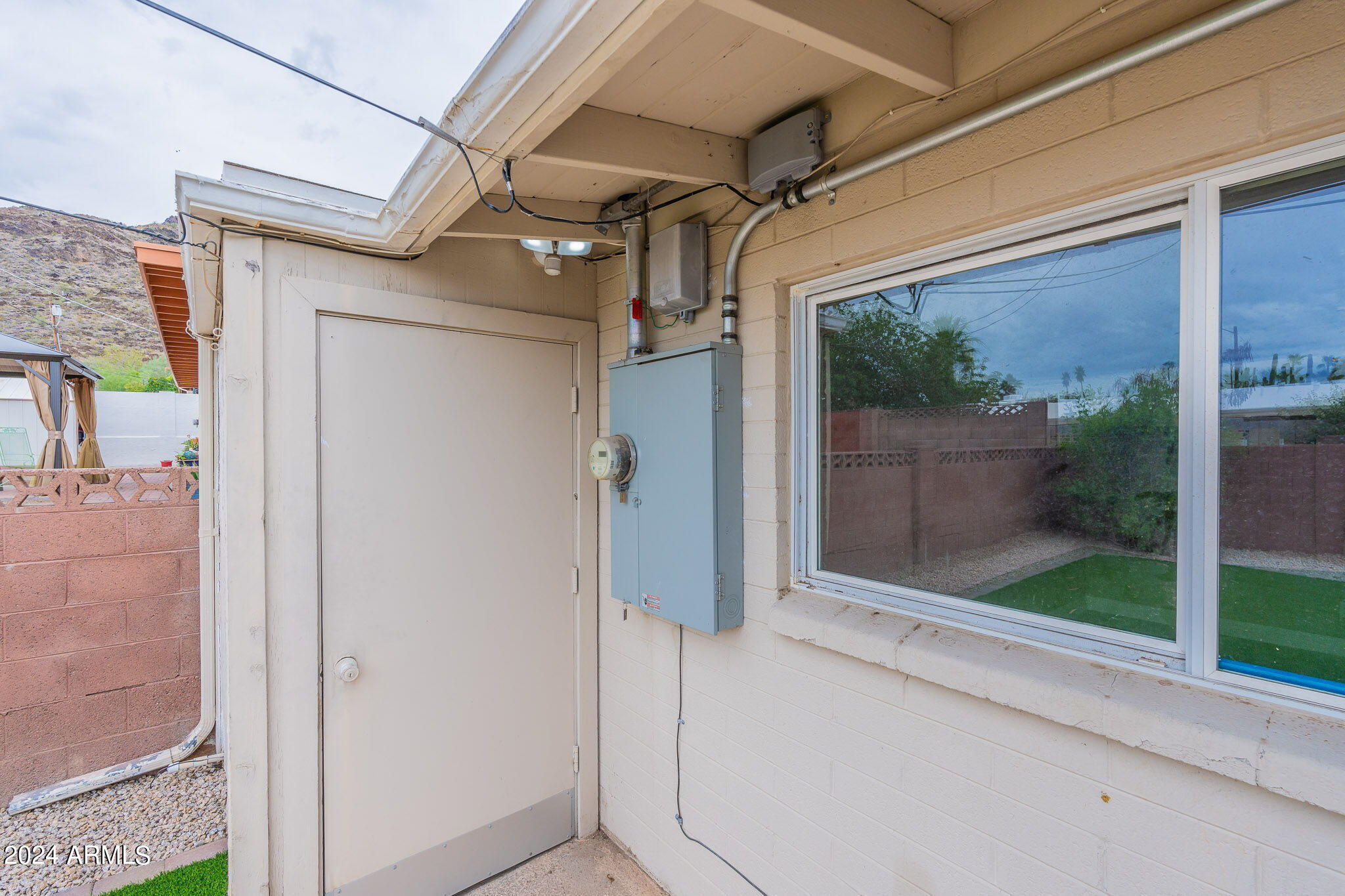 1320 East Orchid Lane Phoenix, AZ 85020 - Photo 46 of 48 a glass door with a glass door and shower