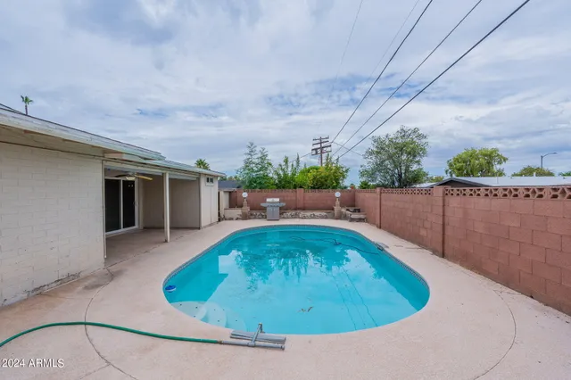 a view of a house with a swimming pool