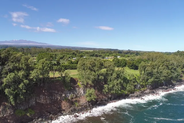 a view of a lake with mountains in the background