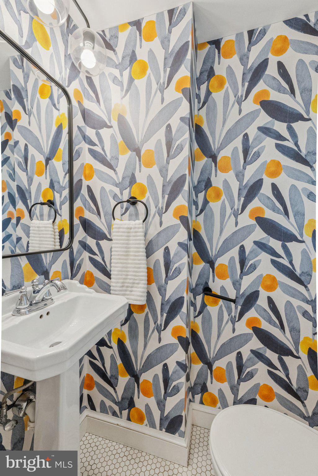 657 E Street Southeast Washington, DC 20003 - Photo 15 of 41 a bathroom with a sink and a shower curtain