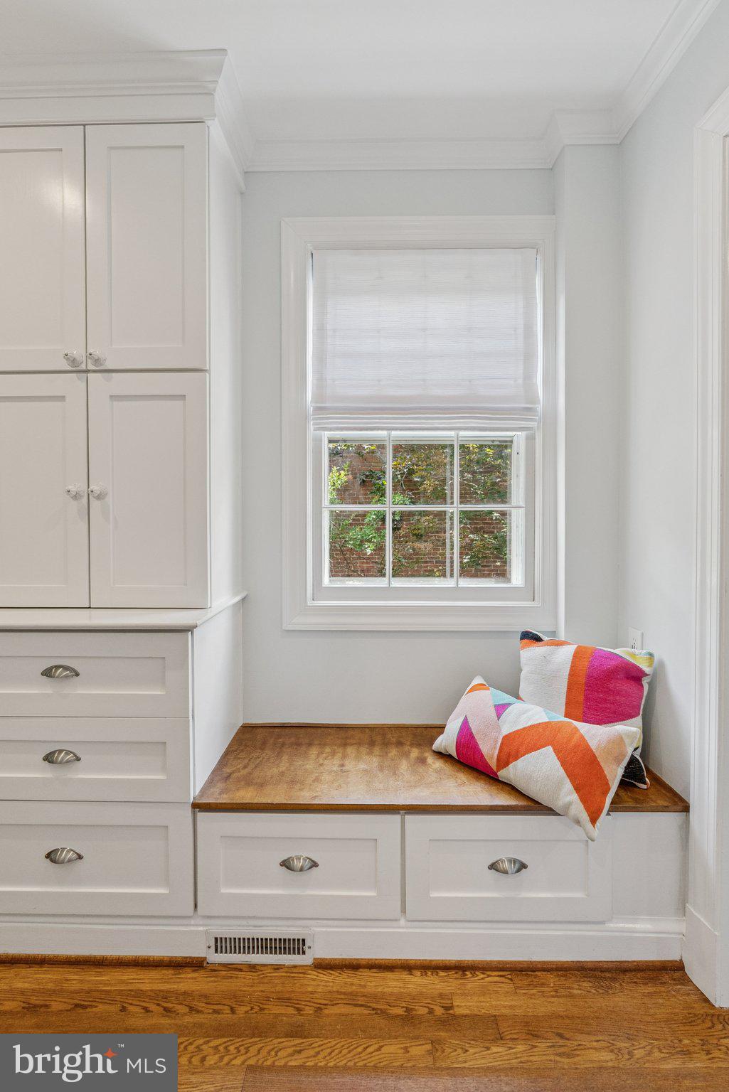 657 E Street Southeast Washington, DC 20003 - Photo 21 of 41 a bathroom with a window and dresser
