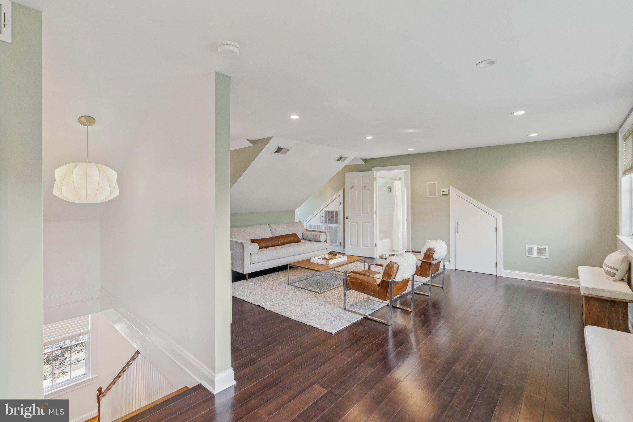 657 E Street Southeast Washington, DC 20003 - Photo 29 of 41 a living room with furniture and wooden floor