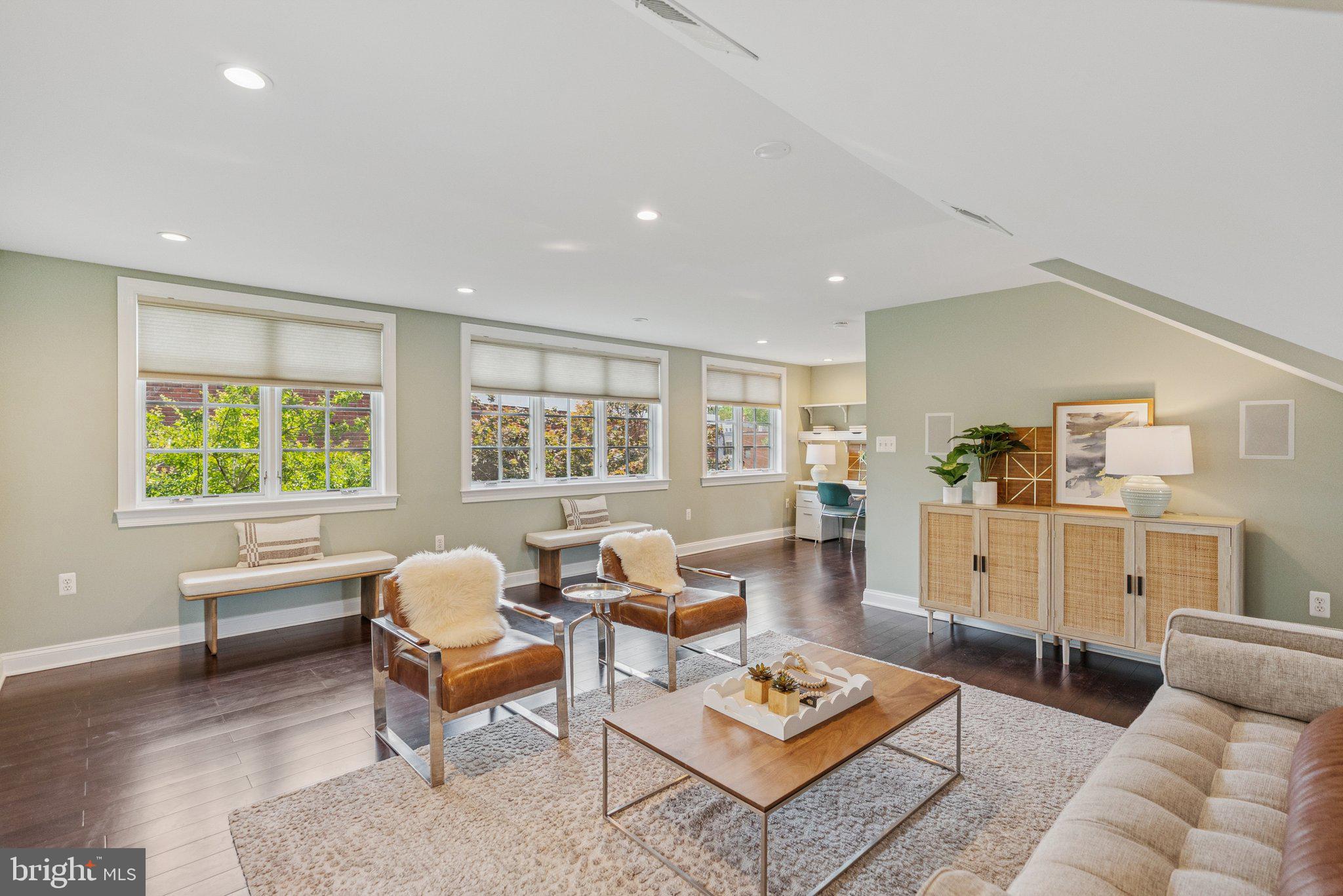 657 E Street Southeast Washington, DC 20003 - Photo 31 of 41 a living room with furniture a rug and a window