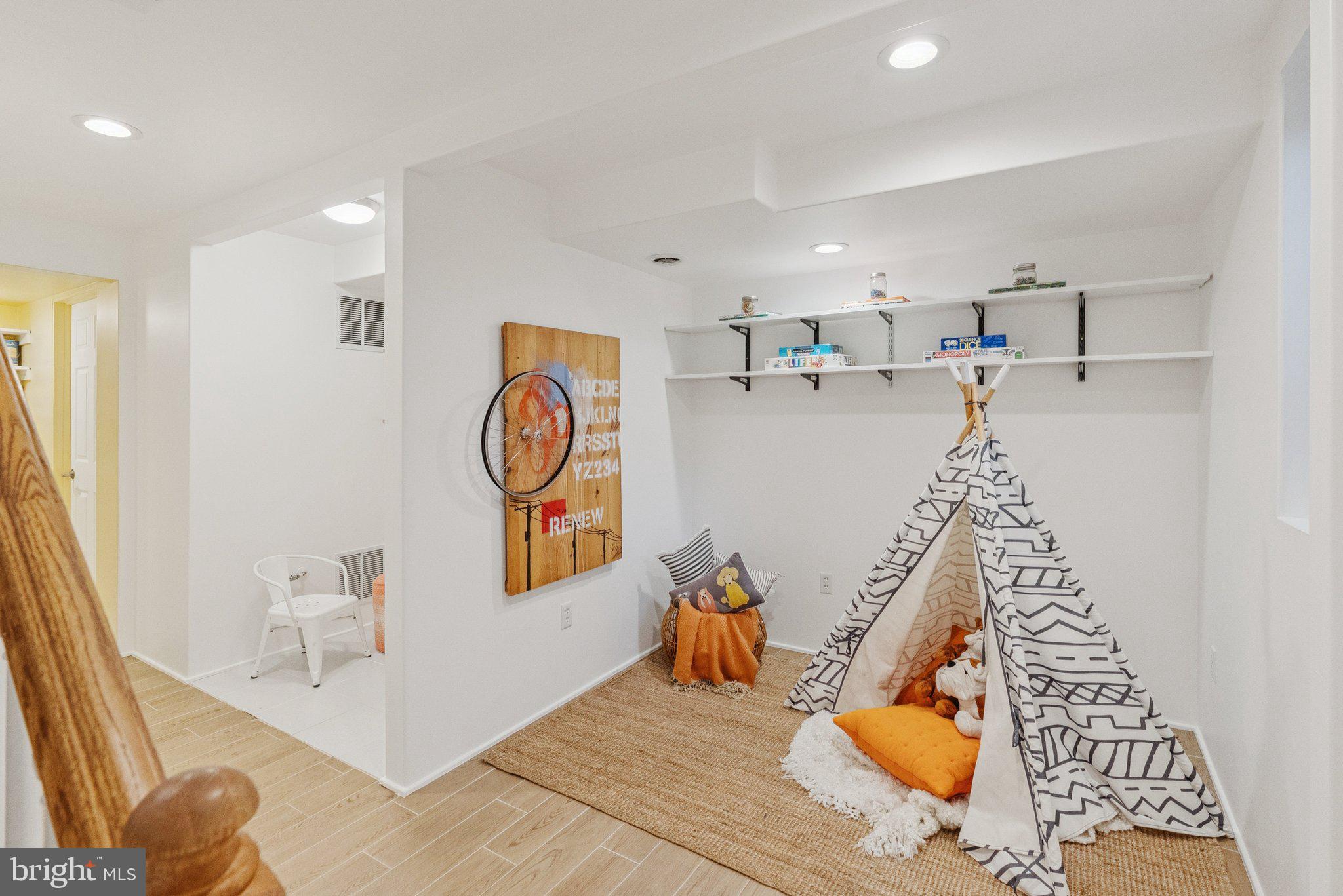 657 E Street Southeast Washington, DC 20003 - Photo 36 of 41 a living room with furniture and a rug