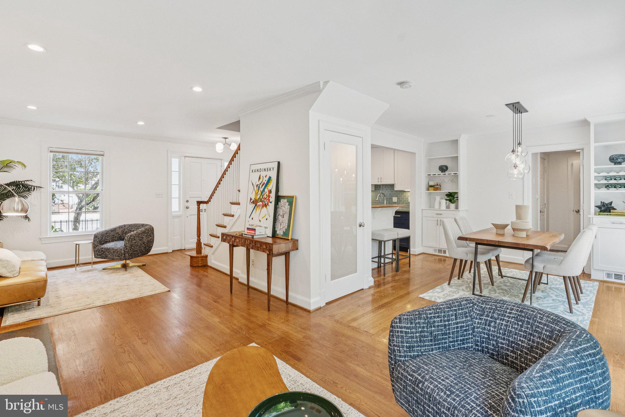 657 E Street Southeast Washington, DC 20003 - Photo 9 of 41 a living room with furniture rug and wooden floor