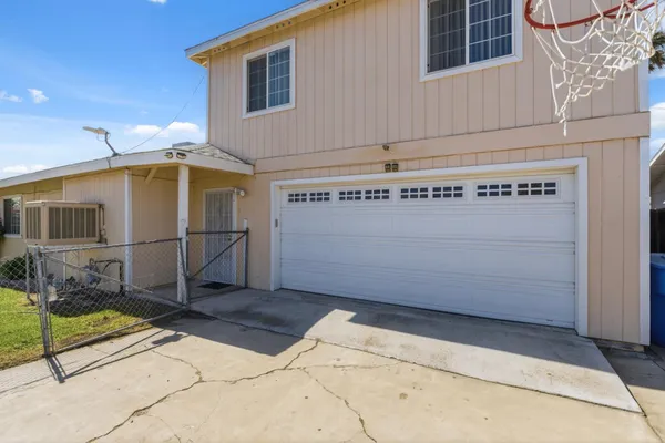 a front view of a house with a garage