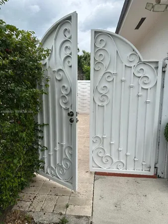 a view of a backyard of the house