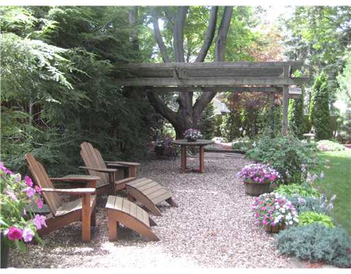 Yard/Garden. Sit back, relax and enjoy  the song birds and the wind chimes swaying gently in the breeze.