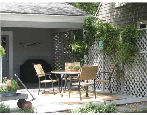 Patio/Deck. The dining deck is easily accessed from the family room.  The covered inclosure permits outdoor grilling during all weather conditions.