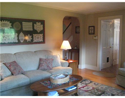 10 Milton Road Barrington, RI 02806 - Photo 10 of 12 Living Room. Crown mouldings, archways and attractive hardwoods are a hallmark of the craftsmanship found throughout the home..