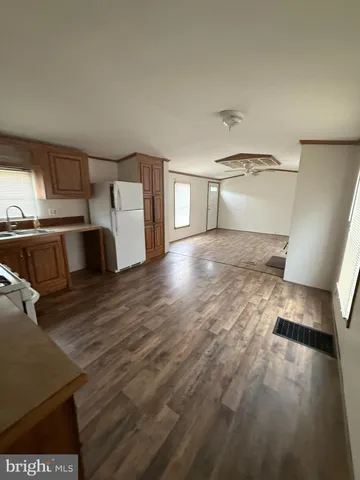 a view of a kitchen with a sink
