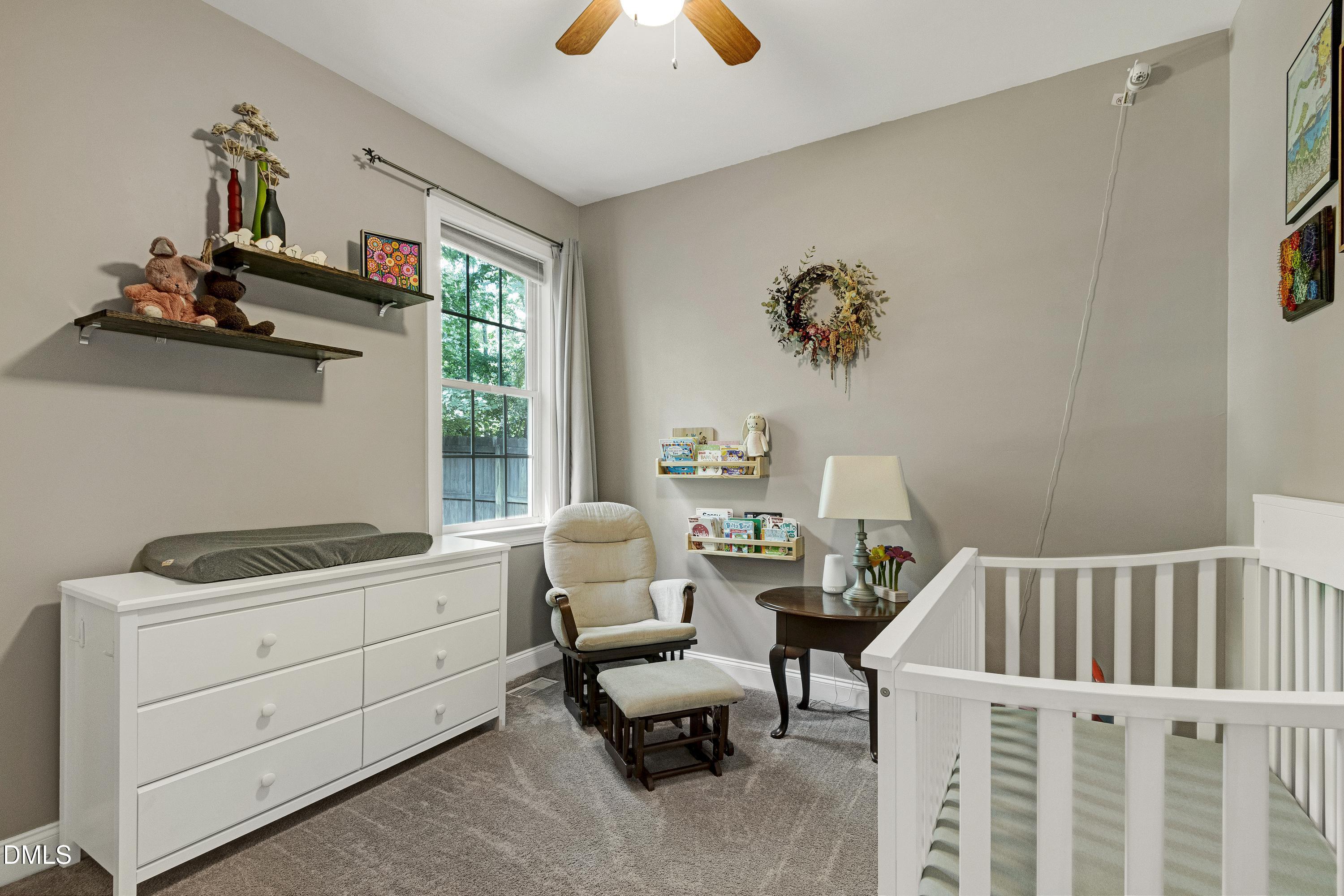 1320 Taylor Farm Road Raleigh, NC 27603 - Photo 27 of 56 a bedroom with furniture and a window