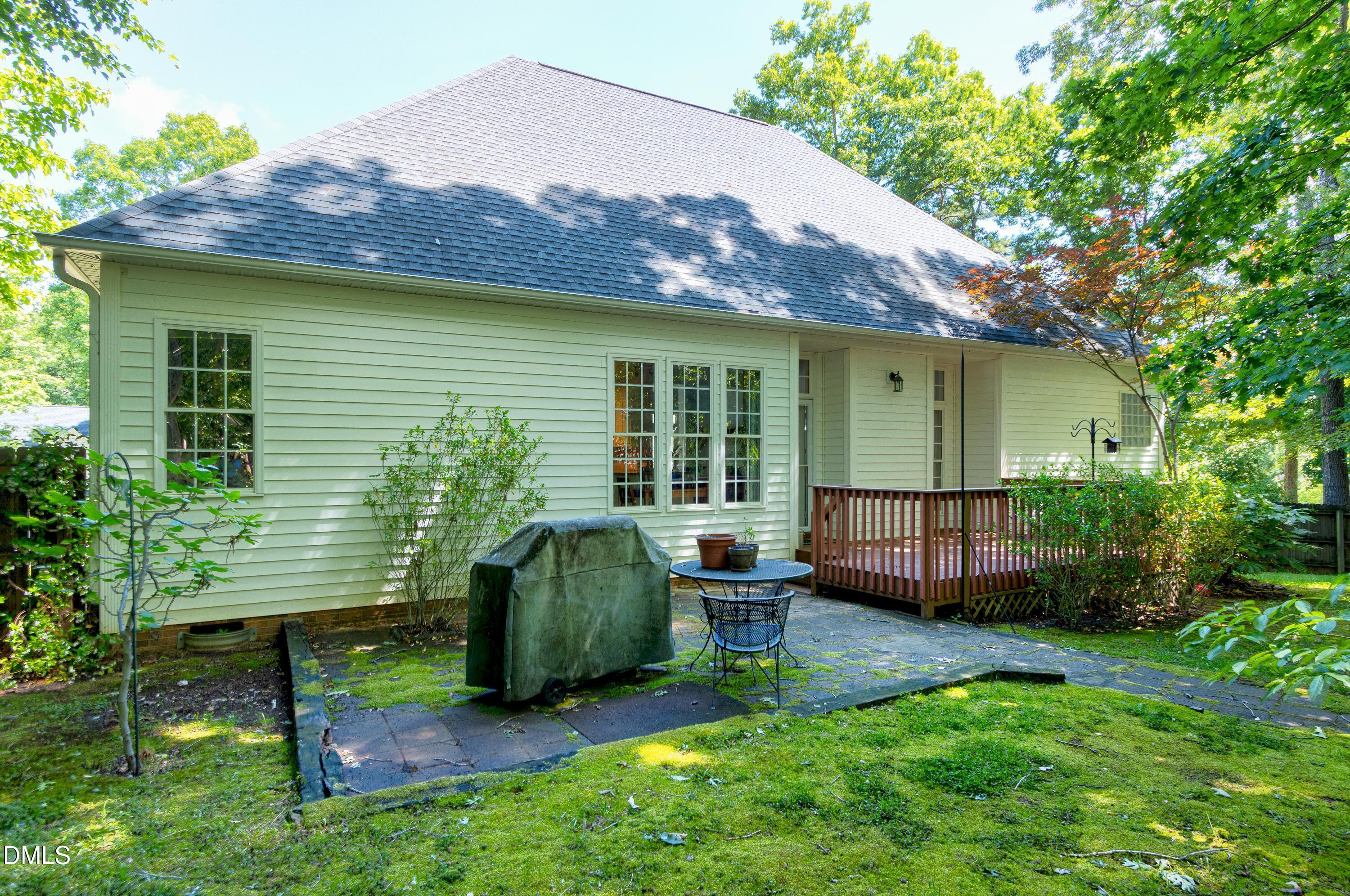 1320 Taylor Farm Road Raleigh, NC 27603 - Photo 35 of 56 a view of a house with backyard and sitting area