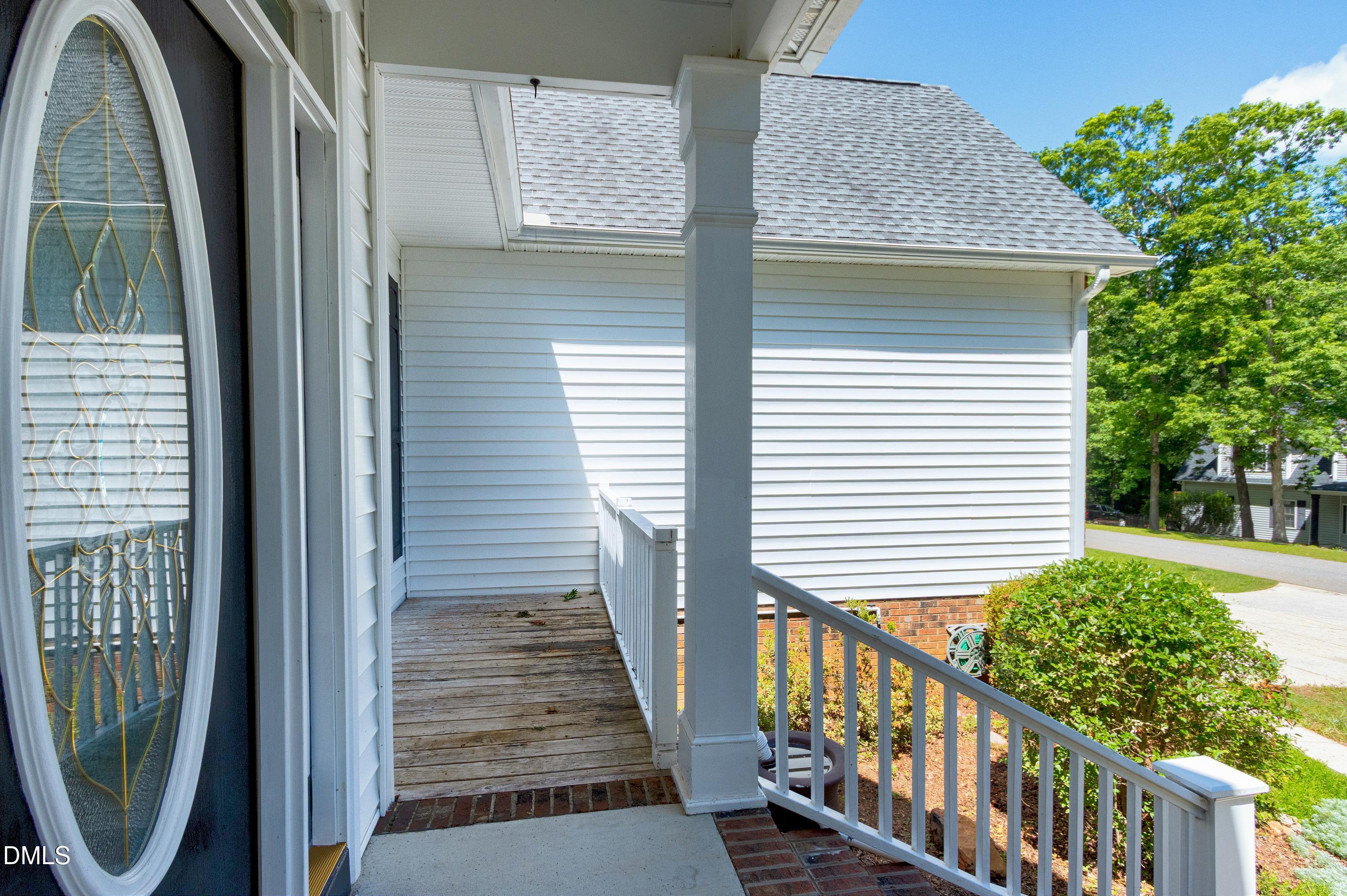 1320 Taylor Farm Road Raleigh, NC 27603 - Photo 4 of 56 a view of a house with wooden floor and a window