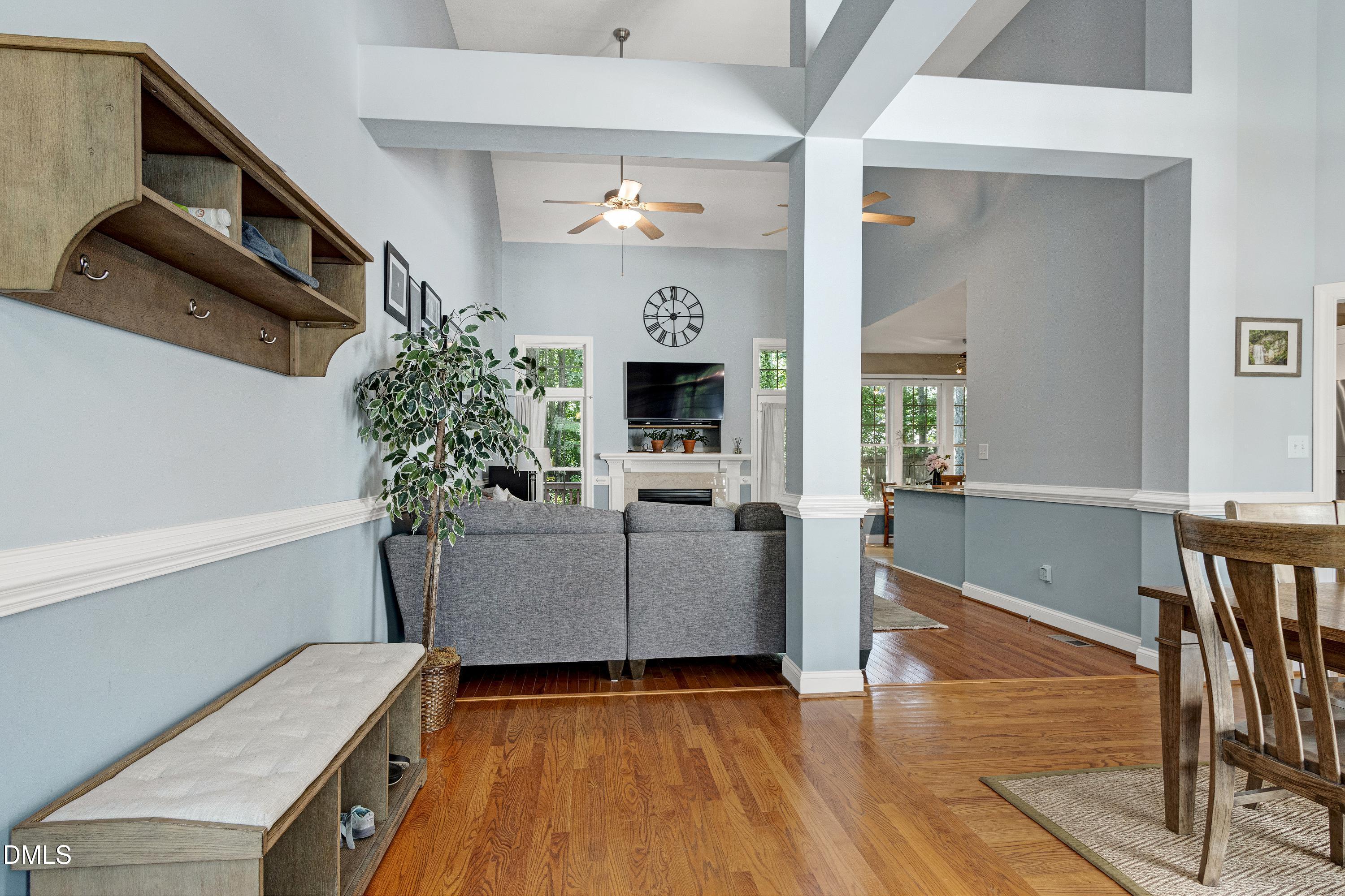 1320 Taylor Farm Road Raleigh, NC 27603 - Photo 5 of 56 a living room with furniture and a fireplace