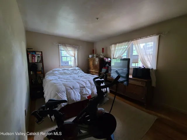 a bed room with a bed and furniture