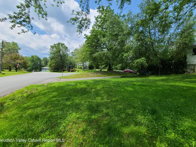 a view of a house with a big yard