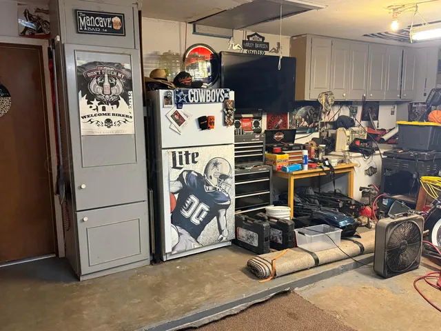 a view of a tree in a yard with a large tree