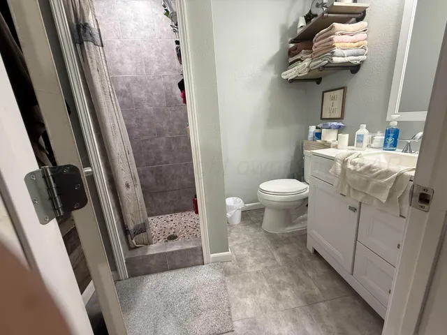 a bathroom with a sink and toilet