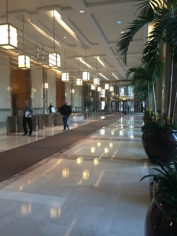 a view of a lobby with gym equipment