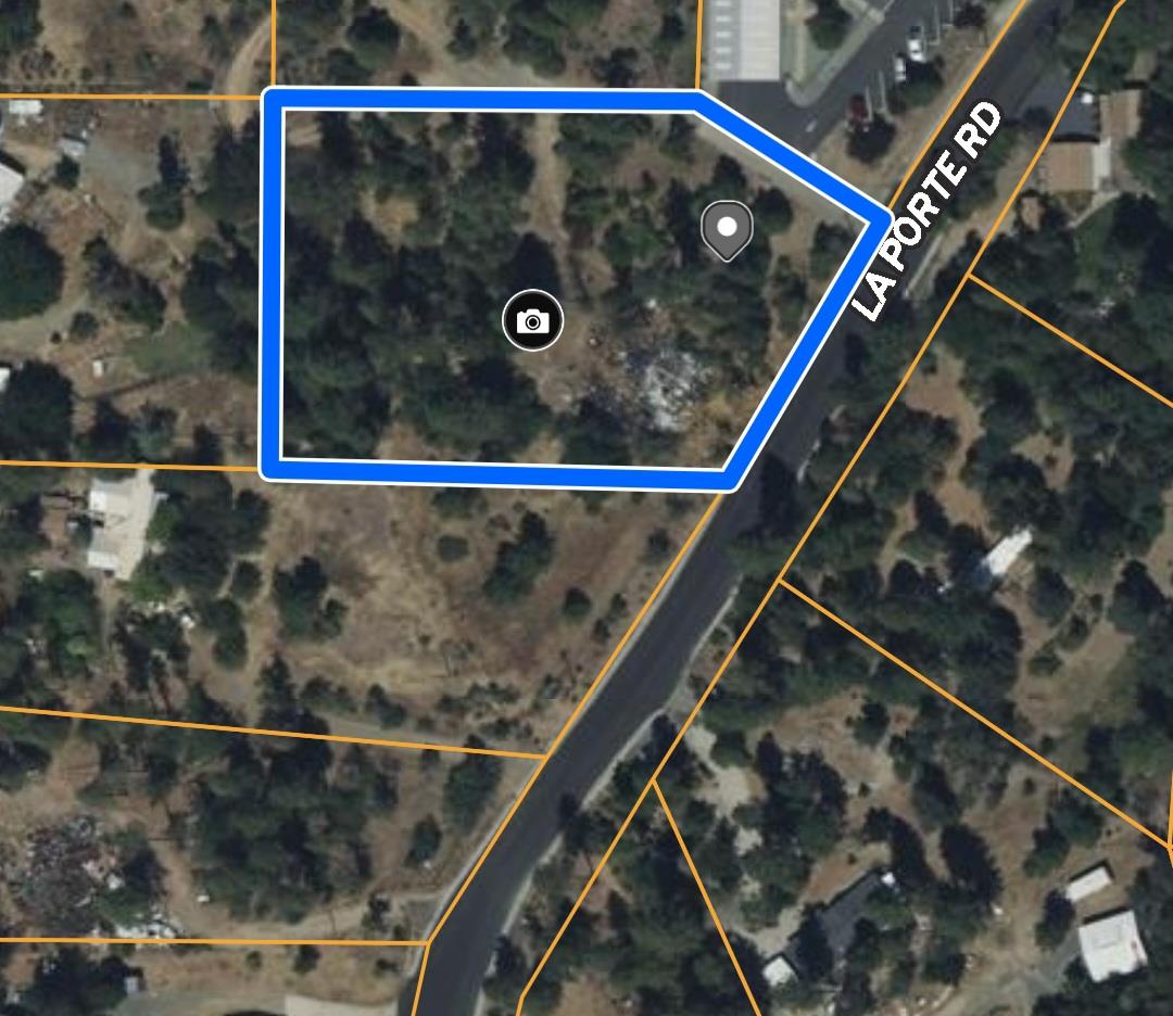 8671 La Porte Road Brownsville, CA 95919 - Photo 13 of 13 a view of water heater and wooden stairs