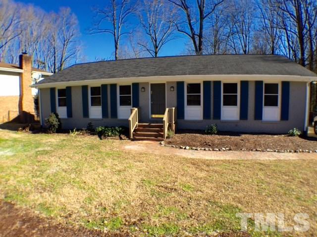 5016 Dantree Place Raleigh, NC 27609 - Photo 1 of 16 a view of a house with a yard