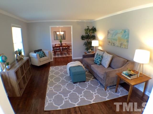 5016 Dantree Place Raleigh, NC 27609 - Photo 10 of 16 a living room with furniture and wooden floor