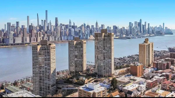 a view of a city with tall buildings