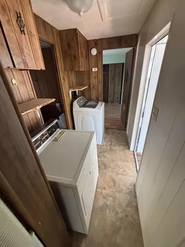 a view of living room washer and dryer