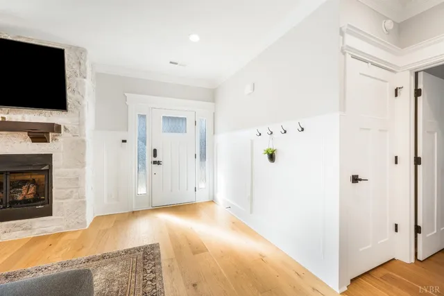 a view of a livingroom with wooden floor