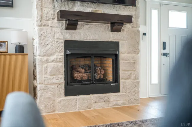a living room with a fireplace