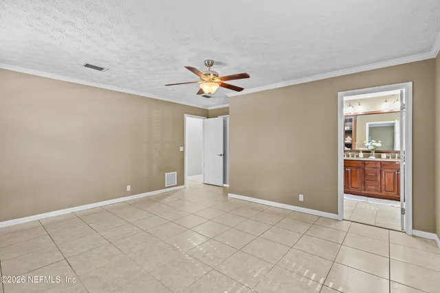 a bathroom with a toilet a sink and shower