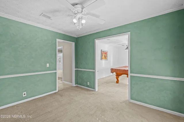 a workspace with furniture and window