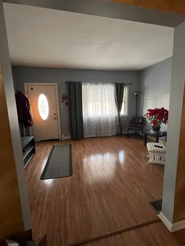 a view of livingroom with furniture and wooden floor