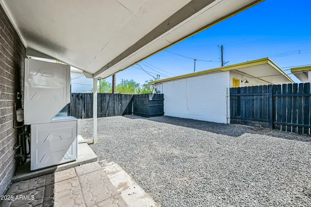 a house view with a backyard space