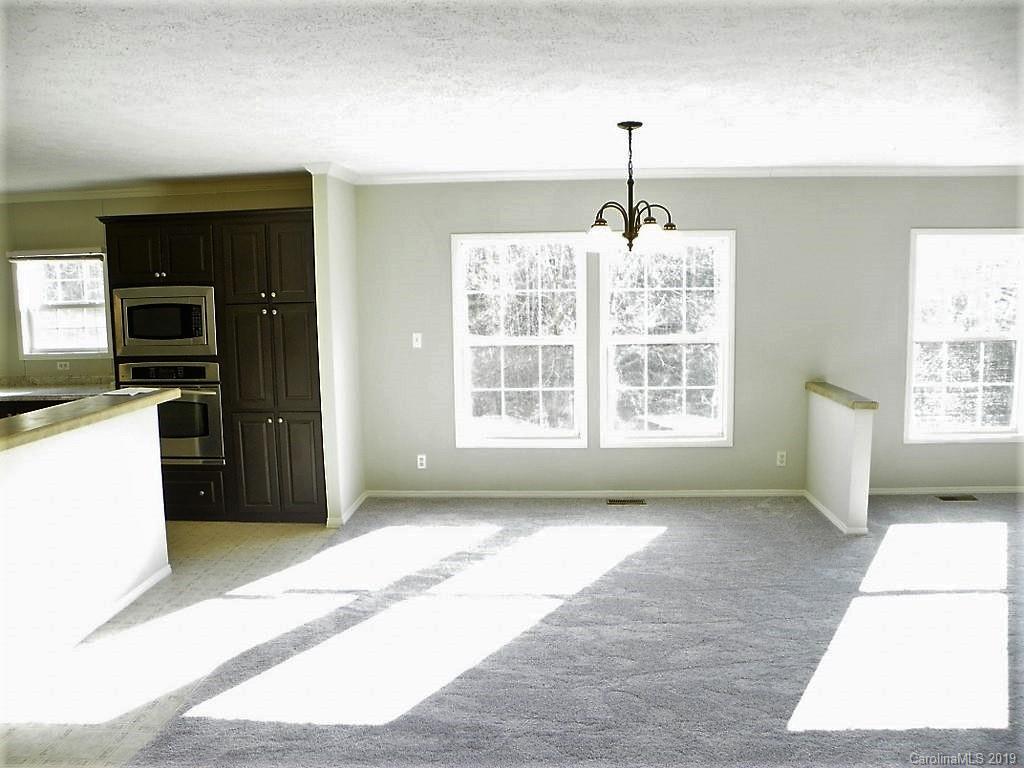 2001 Silver Creek Road Mill Spring, NC 28756 - Photo 12 of 31 a view of an empty room with a window