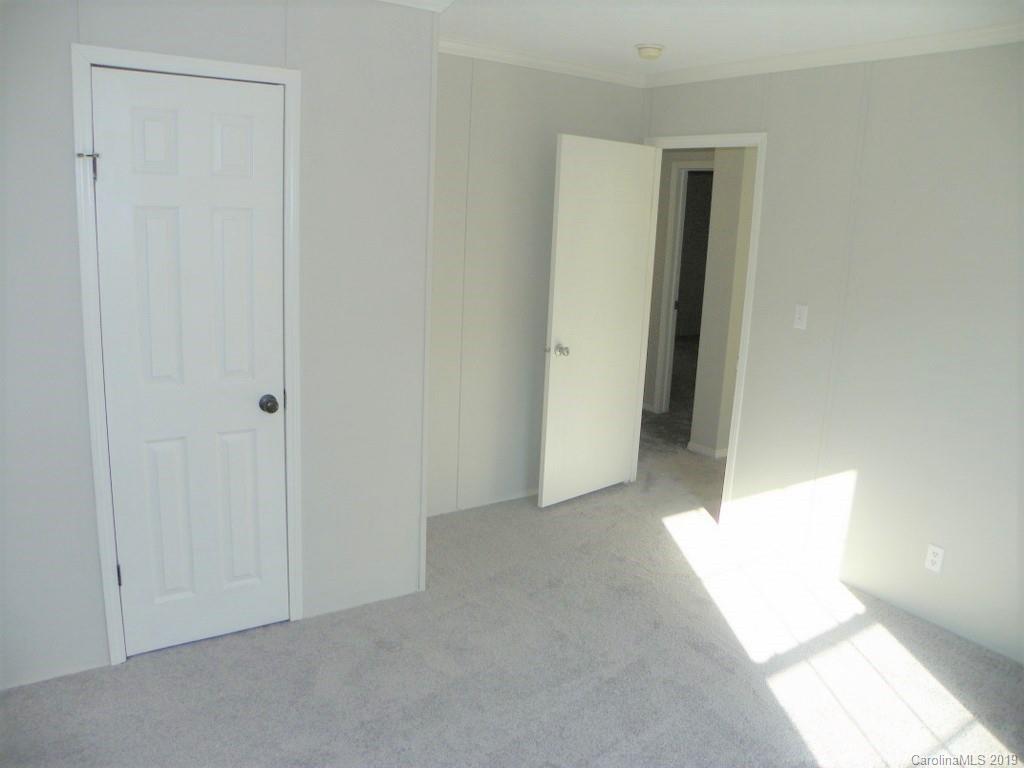 2001 Silver Creek Road Mill Spring, NC 28756 - Photo 23 of 31 a view of an empty room