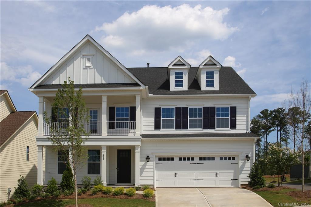 288 Helton Lane, Unit 9 Fort Mill, SC 29708 - Photo 1 of 24 a front view of a house with a yard