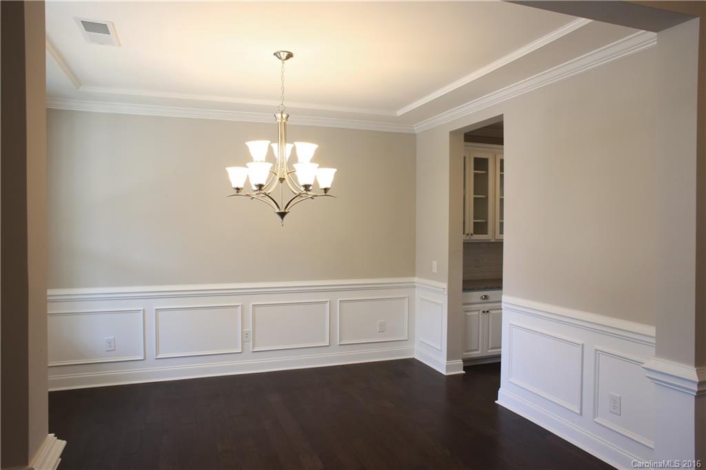 288 Helton Lane, Unit 9 Fort Mill, SC 29708 - Photo 14 of 24 a view of a room with wooden floor closet and windows