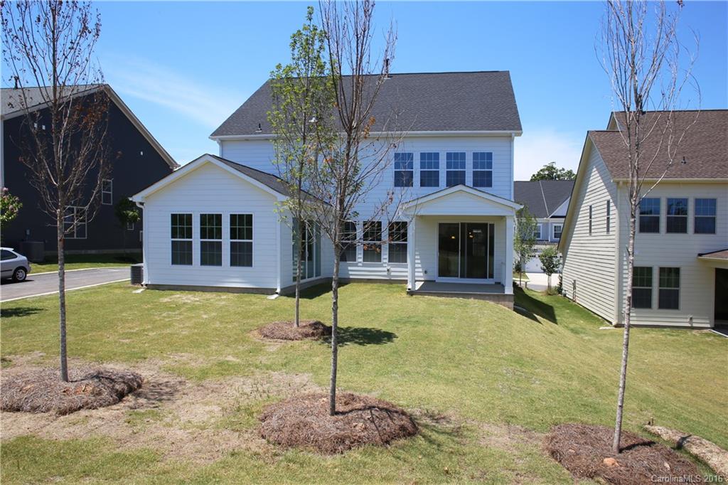 288 Helton Lane, Unit 9 Fort Mill, SC 29708 - Photo 5 of 24 a front view of a house with garden