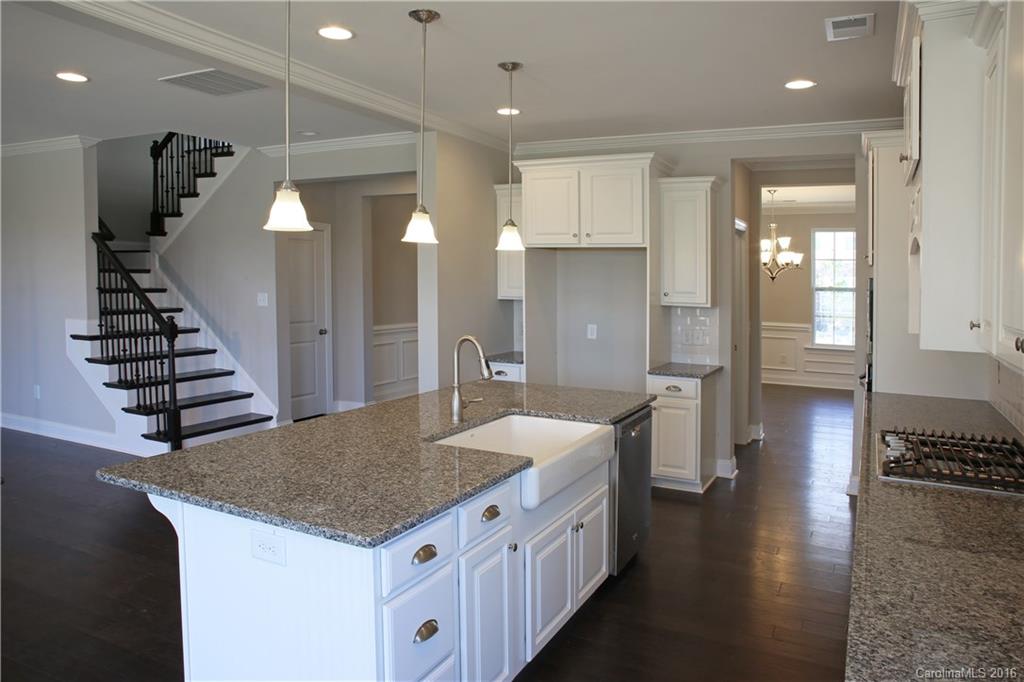 288 Helton Lane, Unit 9 Fort Mill, SC 29708 - Photo 8 of 24 a kitchen with sink and refrigerator